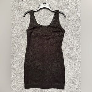 Black dress with light gold shimmer leopard print. Forever21 size medium.
